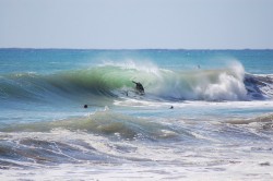 Valiant effort on a surfboard.